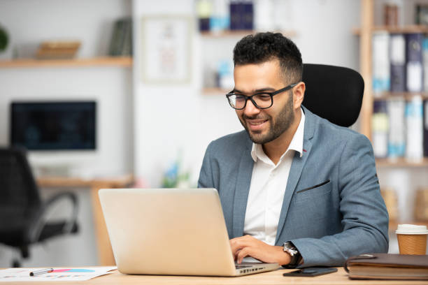 Professional working on laptop